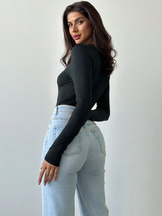 Black Fitted Long-Sleeve Top with Hollow Rose Metal Accent