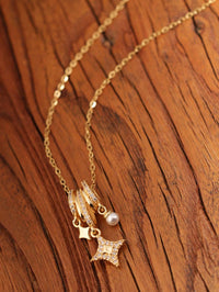 18K Gold-Plated Aurora Star Pendant Necklace with Pearl and Crystals.