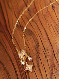18K Gold-Plated Aurora Star Pendant Necklace with Pearl and Crystals.