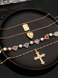 4-Piece Layered Necklace Set – 18K Gold-Plated, Cubic Zirconia Heart & Cross Pendants, Women's Jewellery Gift.