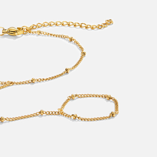 18K GOLD HAND CHAIN BRACELET