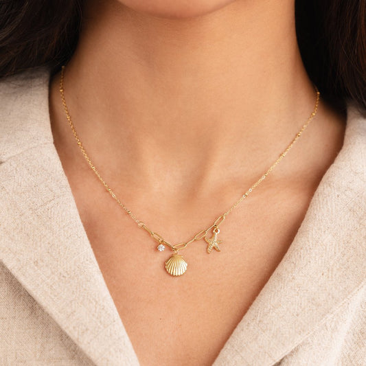 18K Gold Seashell & Starfish Pendant Necklace – Coastal Elegance